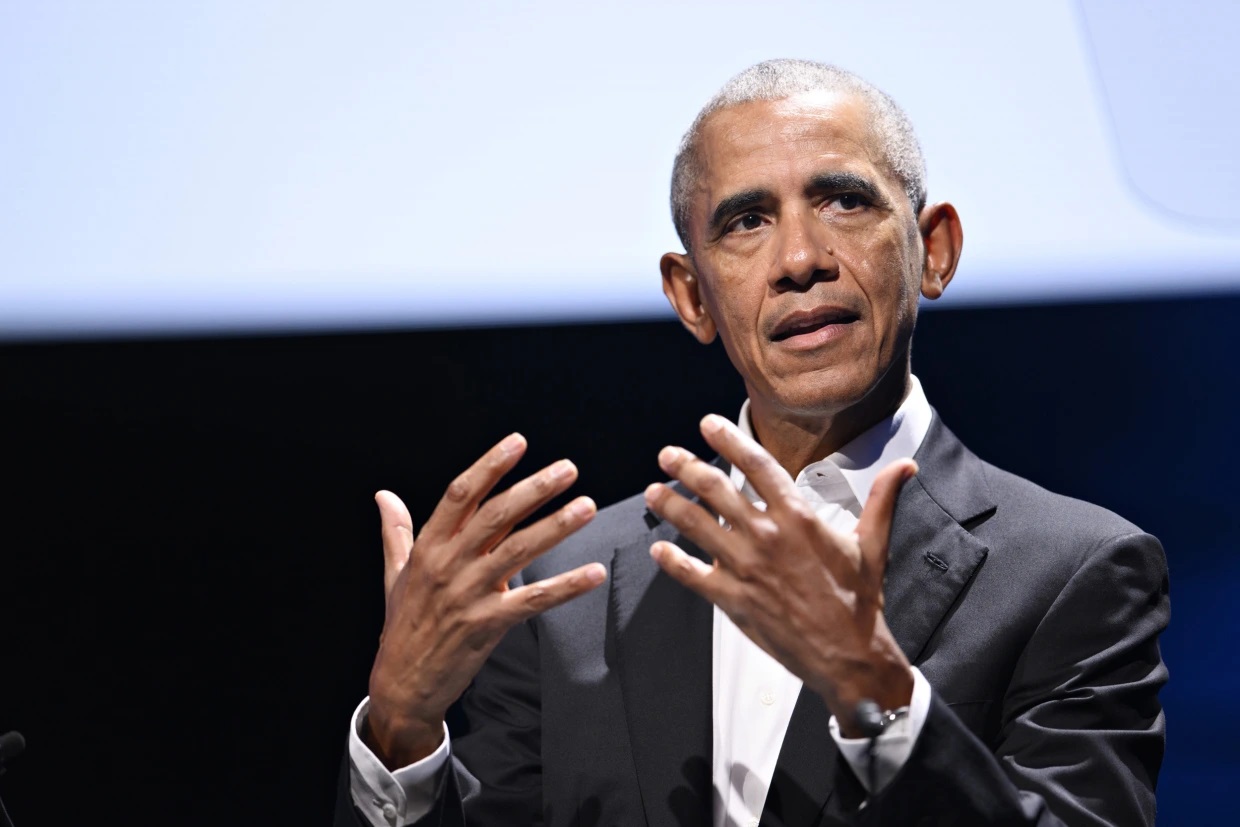 Former U.S. President Barack Obama campaigning for Democrats running