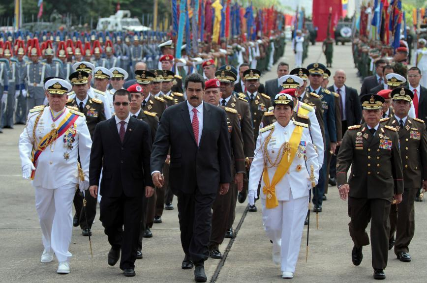 Venezuela’s President Nicholas Maduro leads a military march