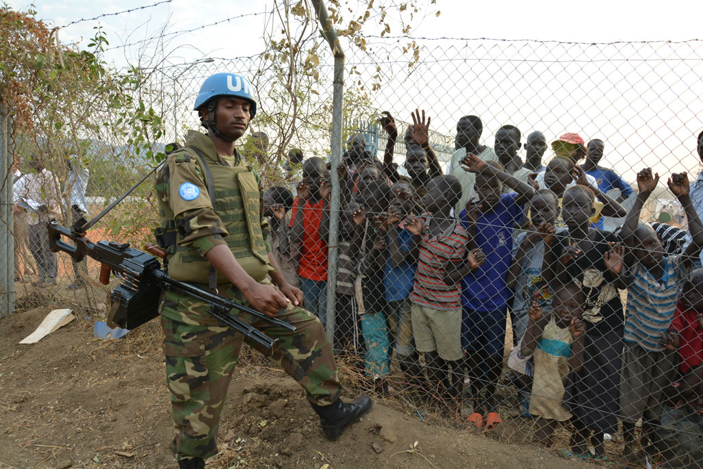A UN peacekeeper stands guard in South Sudan