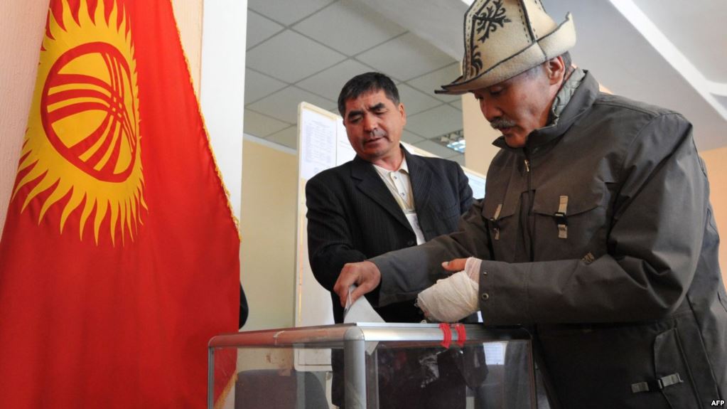 Kyrgyzstan votes in closely fought presidential battle, second-round likely