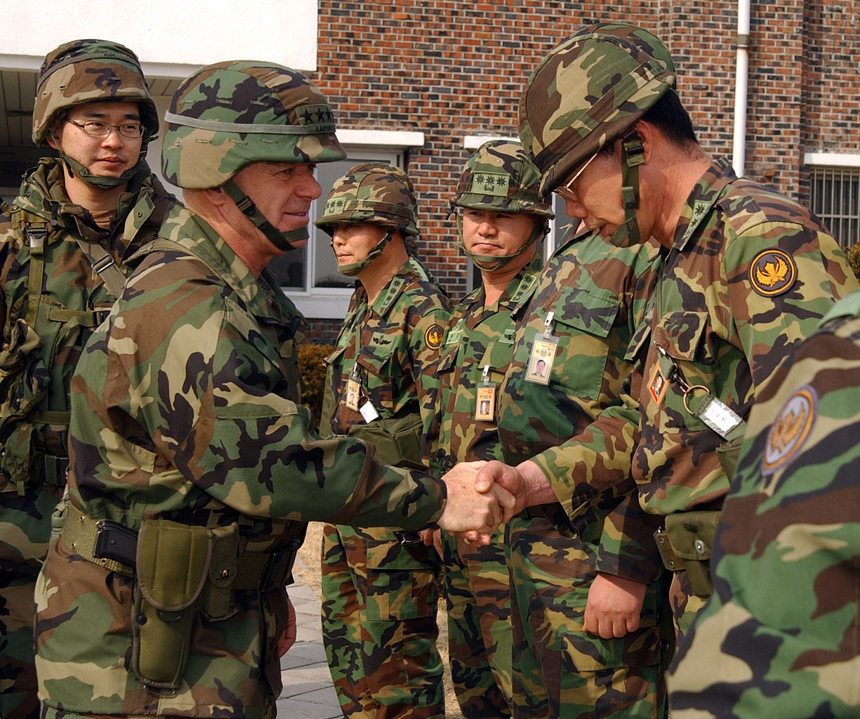 Commanding Officer, U.S. Forces Korea, U.S. Army Gen. Leon J. Laporte, left, greets Third Republic of Korea Army personnel while visiting the Combined Aviation Force Headquarters for an exercise brief during Reception, Staging, Onward movement, and Integration (RSO&I) and Foal Eagle. / OPCON