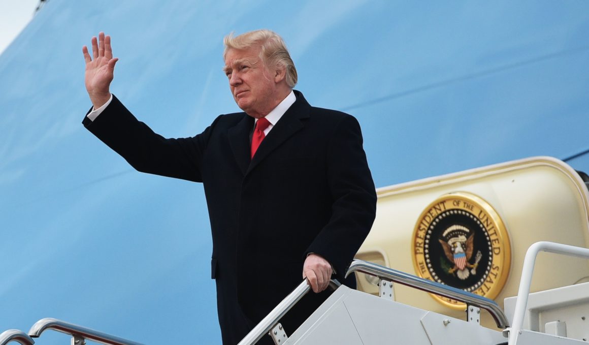 Donald Trump on steps to Air Force one ahead of foreign trip