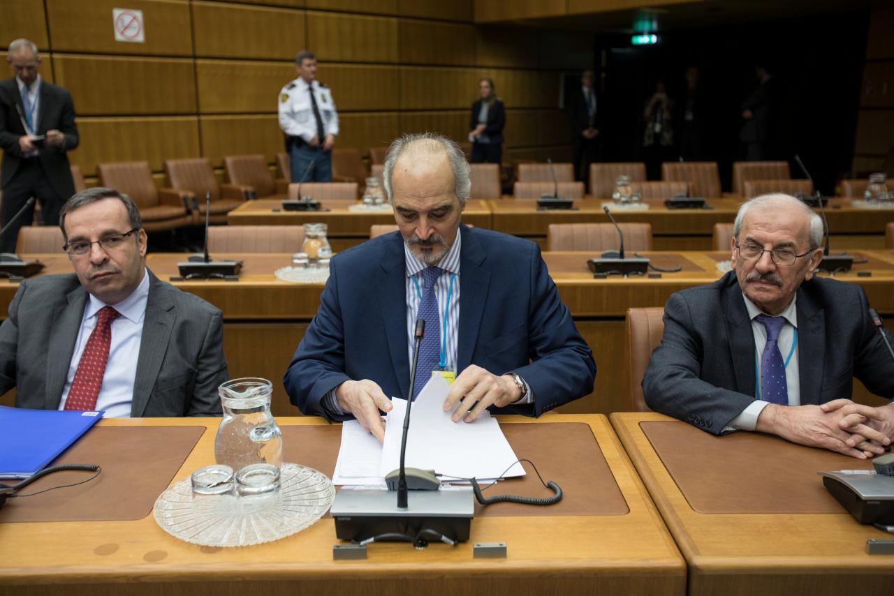 Bashar al-Jaafari (C) is pictured ahead the start of talks on Syria in Vienna