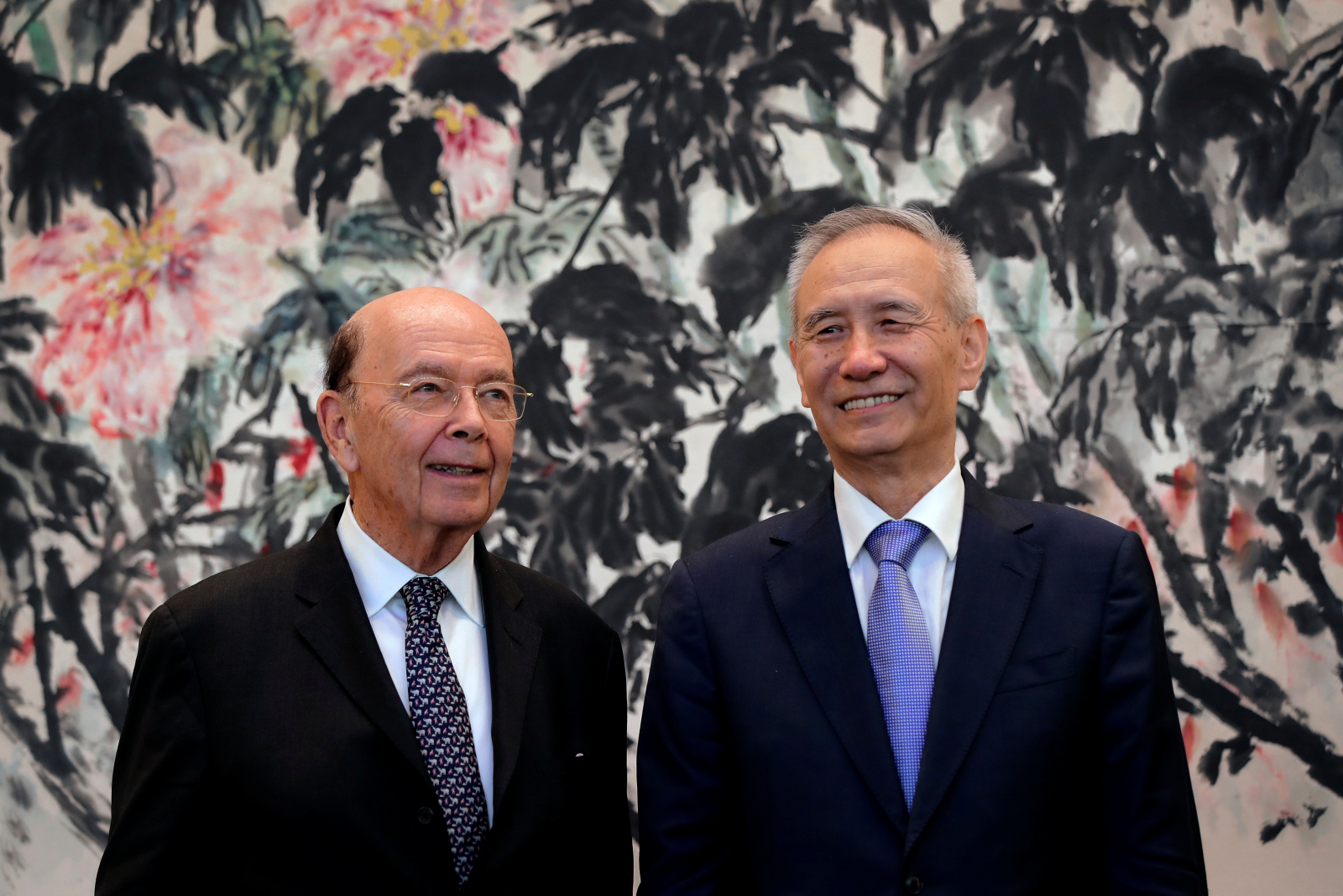 u-s-commerce-secretary-wilbur-ross-left-chats-chinese-vice-premier-liu-he-during-photograph