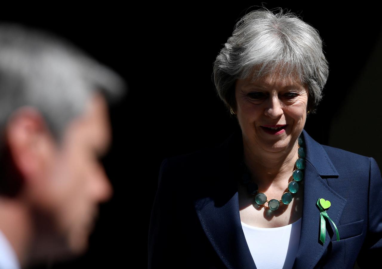 Britain’s Prime Minister May leaves Downing Street for the Houses of Parliament in London