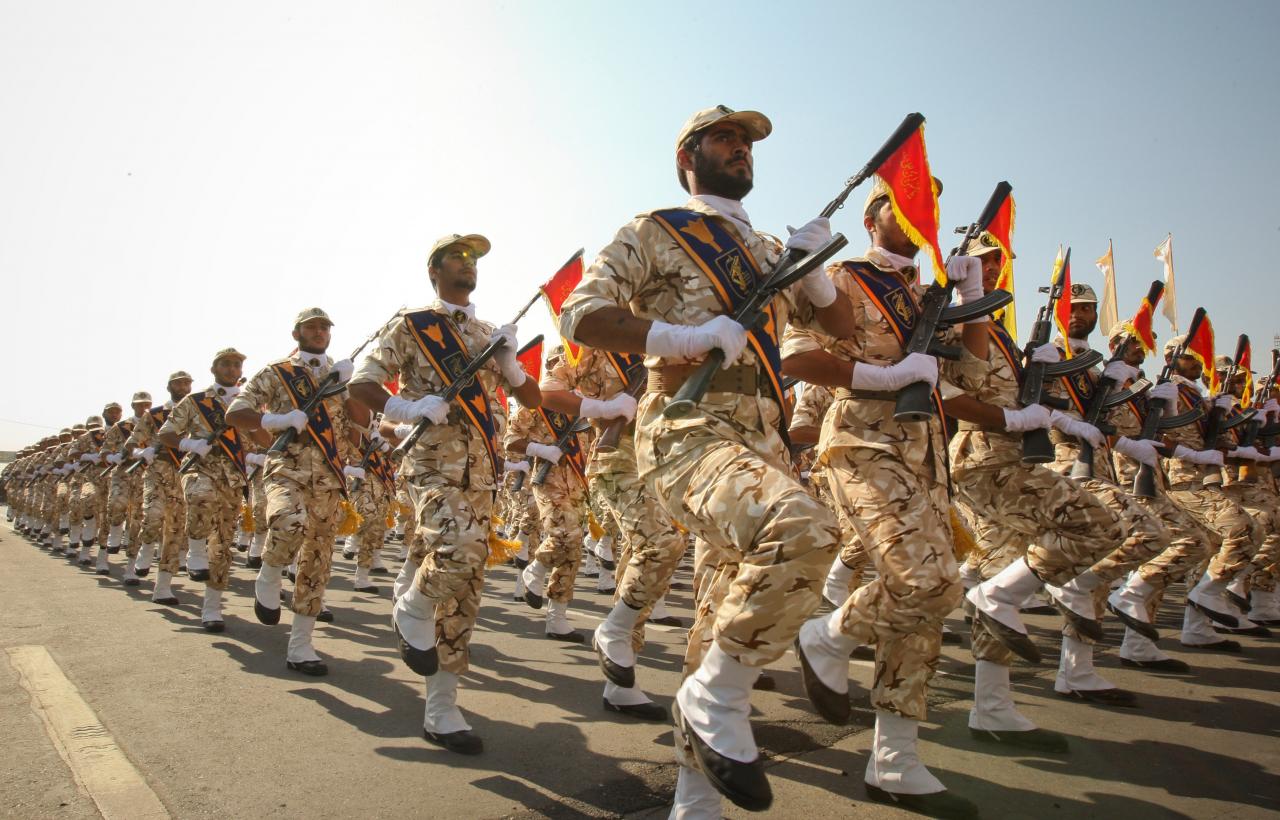 File picture of members of the Iranian revolutionary guard marching at a parade to commemorate anniversary of Iran-Iraq war, in Tehran