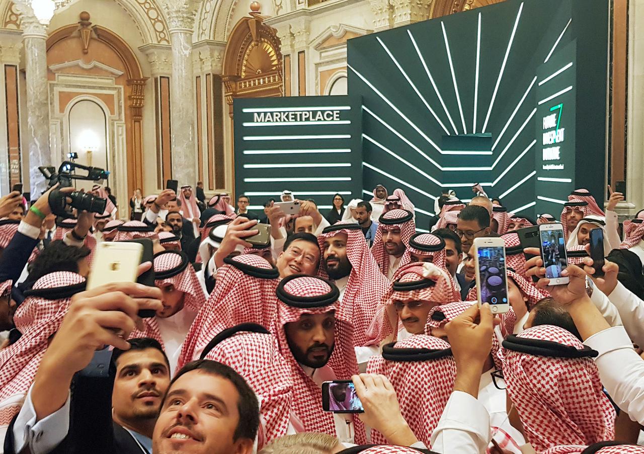 Saudi Arabia’s Crown Prince Mohammed bin Salman poses for a selfie during the Future Investment Conference in Riyadh