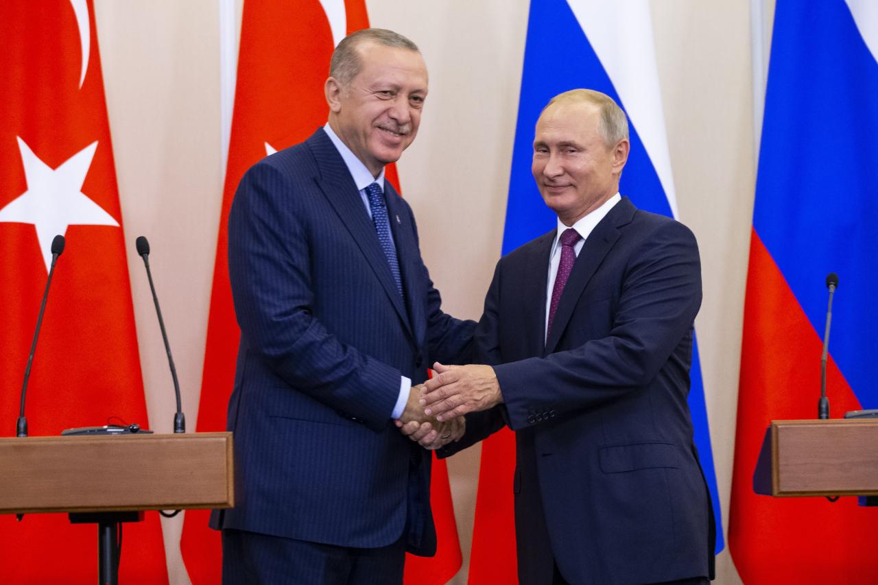 Russian President Putin and his Turkish counterpart Erdogan attend a news conference in Sochi