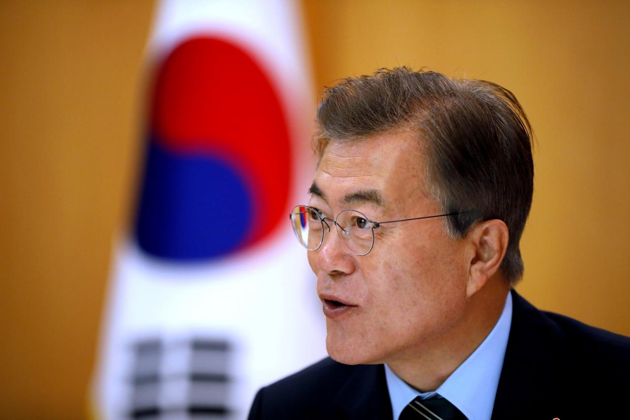 FILE PHOTO: South Korean President Moon Jae-in speaks during Reuters interview in Seoul