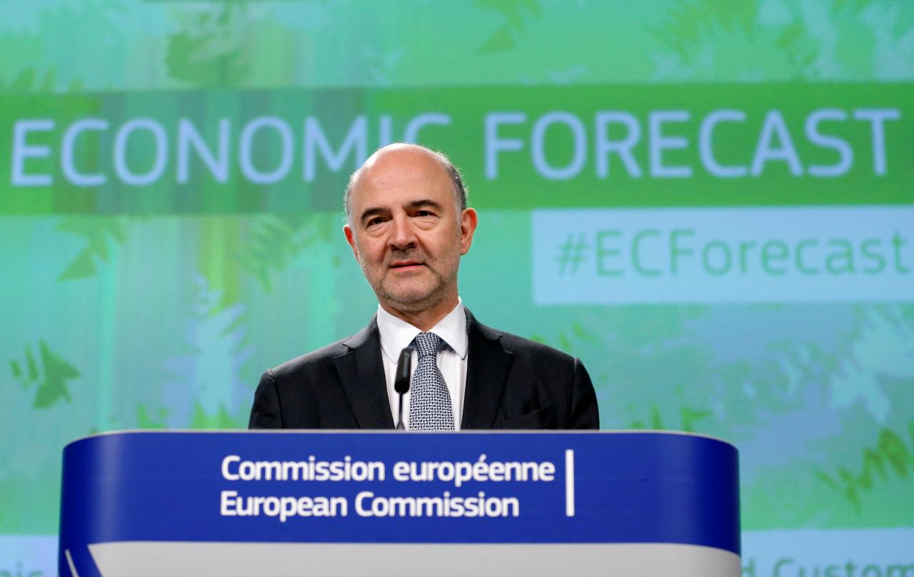 EU Commissioner for Economic and Financial Affairs Moscovici presents the EU executive’s spring economic forecasts during a news conference in Brussels