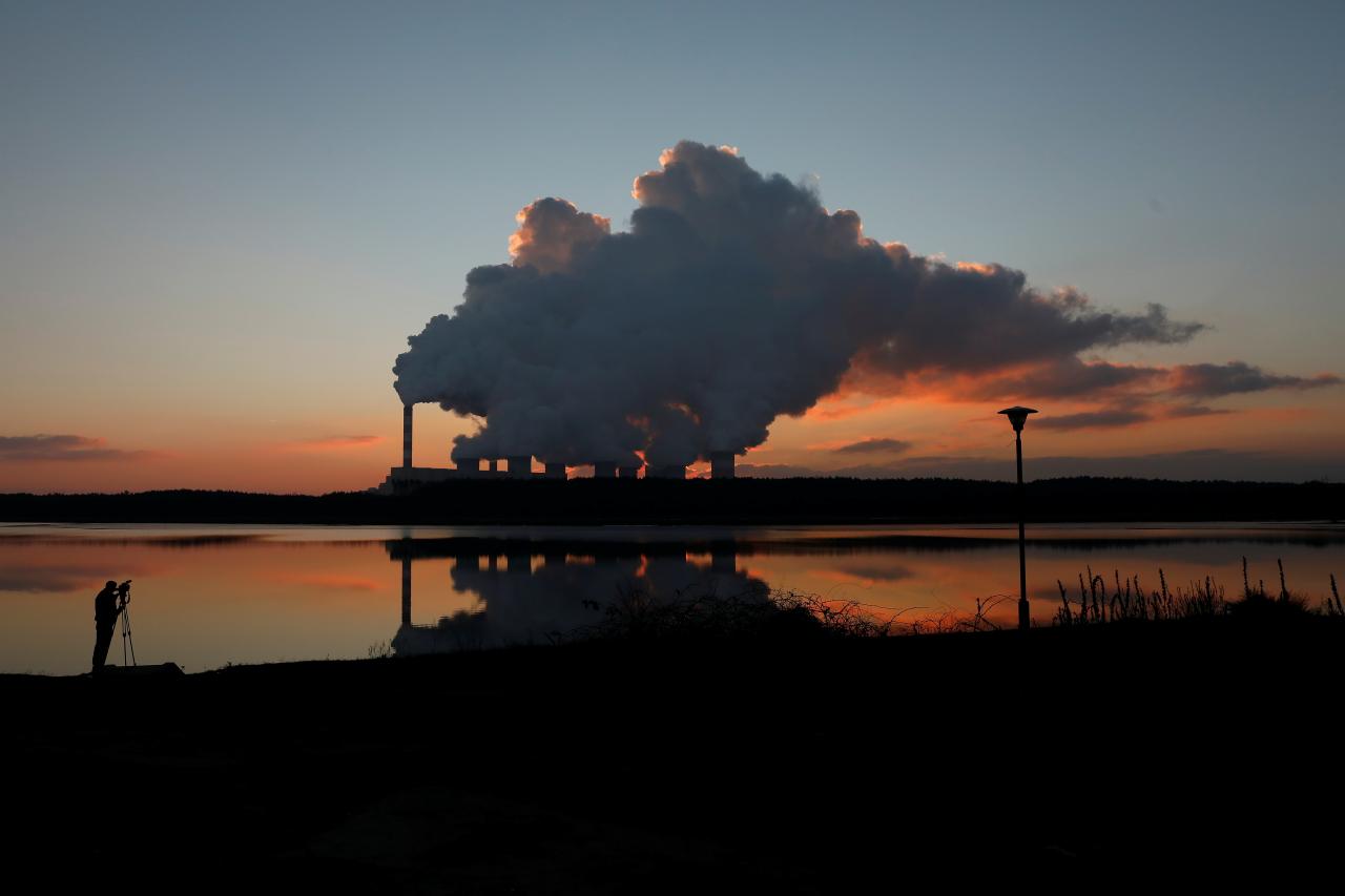 Smoke and steam billows from Belchatow Power Station, Europe’s largest coal-fired power plant operated by PGE Group, near Belchatow,