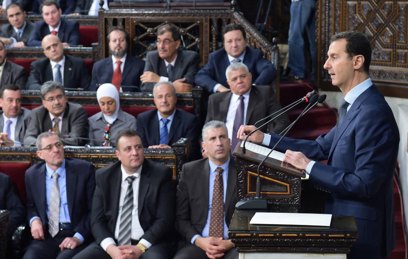 Syrian President Bashar al Assad addresses parliament in 2016 after the last election