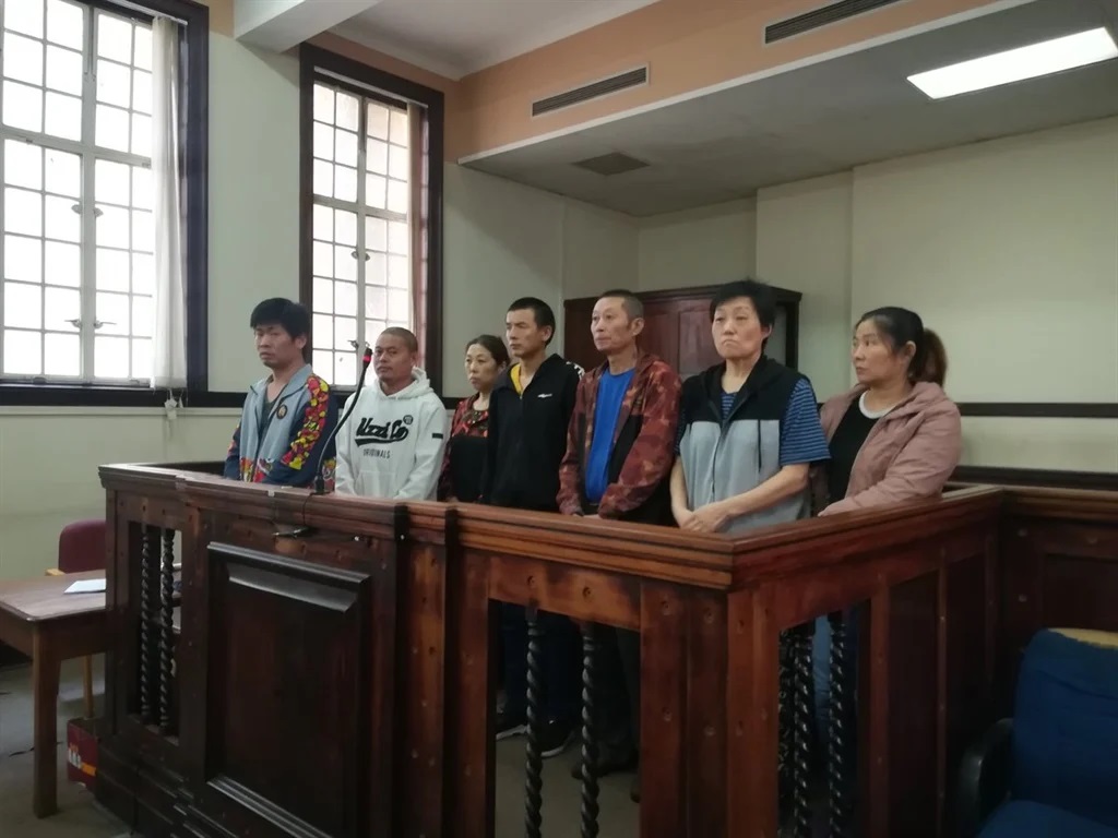 7 Chinese Nationals standing in court in South Africa for trial